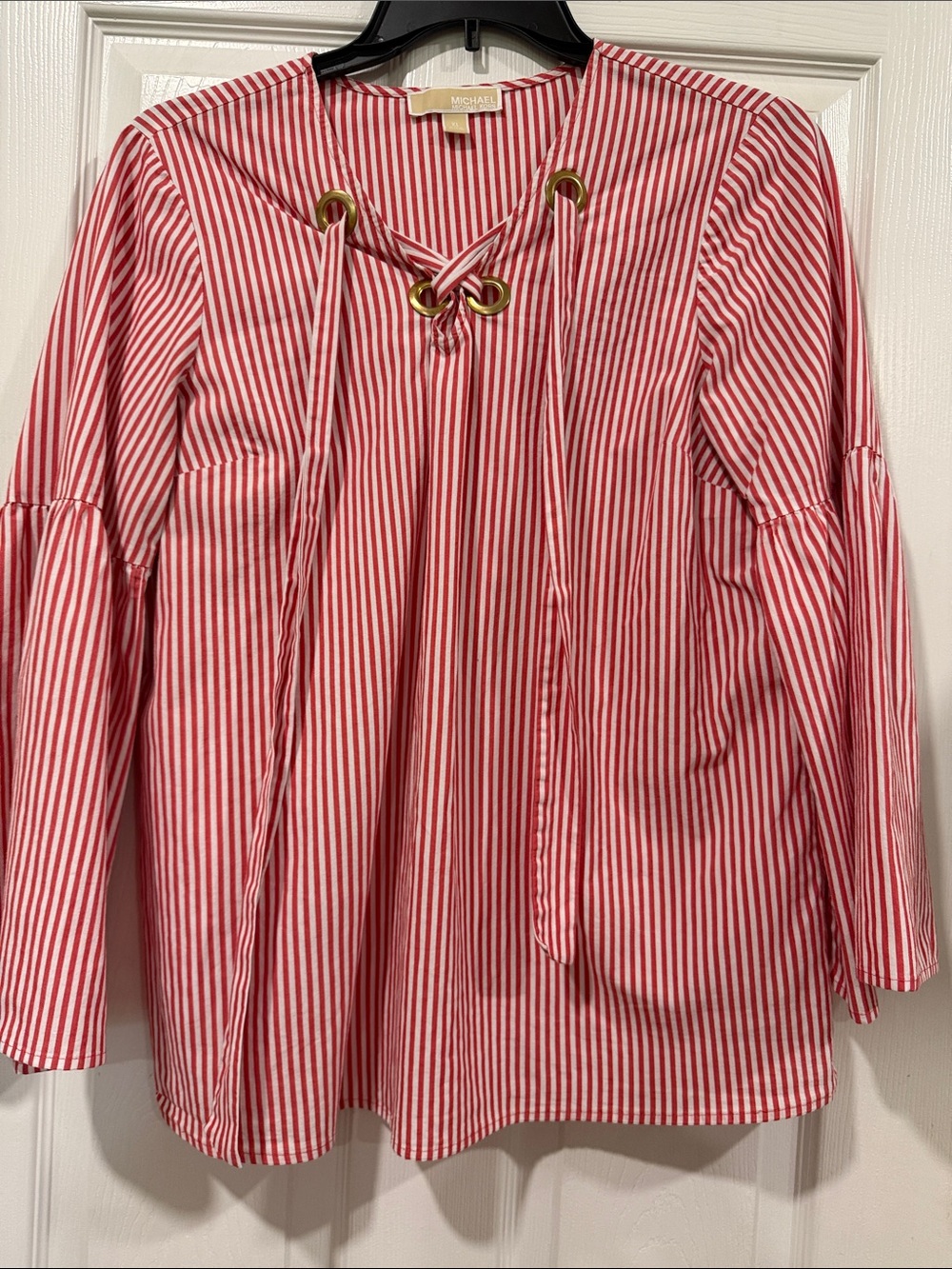 Bell sleeve lace up blouse